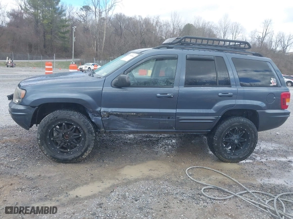 2003 Jeep Grand Cherokee Limited with VIN 1J4GW58N43C521617, listed as a IAAI auction lot 41781064 with 228,086 mi miles. Bid and sale history available at carsss.com. Image 14.