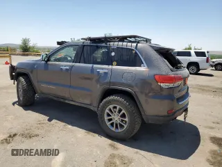 2014 Jeep Grand Cherokee Limited with VIN 1C4RJFBM3EC384398, listed as a Copart auction lot 57703835 with 153,255 mi miles and Salvage title. Bid and sale history available at DreamBid. Image 2.