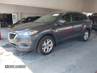 2013 Mazda CX-9 Sport with VIN JM3TB2BAXD0407958, listed as a IAAI auction lot 42346949 with 132,855 mi miles and . Bid and sale history available at DreamBid. Image 2.