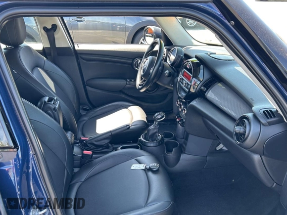 2015 MINI Hardtop 4 Door with VIN WMWXS5C5XFT831166, listed as a Copart auction lot 56714285 with 69,668 mi miles and Salvage Title. Bid and sale history available at DreamBid. Image 5.