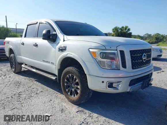 2016 Nissan Titan Platinum Reserve with VIN 1N6BA1F4XGN517905, listed as a IAAI auction lot 42676671 with 110,004 mi miles and . Bid and sale history available at DreamBid. Image 1.