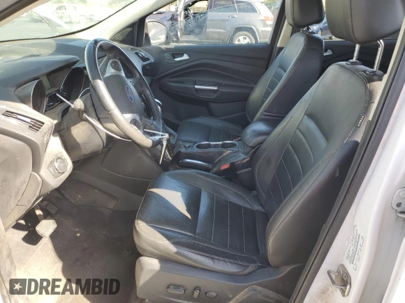 2014 Ford Escape Titanium z VIN 1FMCU0J9XEUD01904, wystawiony jako Copart lot #61819555 z przebiegiem 217 794 mil mil oraz Czysty tytuł • Clean title. Historia ofert i sprzedaży dostępna na DreamBid. Obrazek 7.