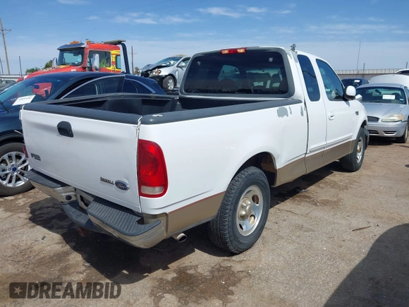 1999 Ford F-150 with VIN 1FTZX1720XKB31945, listed as a IAAI auction lot 42123984 with 187,766 mi miles and . Bid and sale history available at DreamBid. Image 4.