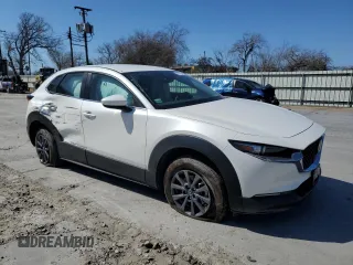 2024 Mazda CX-30 S with VIN 3MVDMBAM0RM665637, listed as a Copart auction lot 47190485 with 8,781 mi miles and Salvage Title. Bid and sale history available at DreamBid. Image 4.
