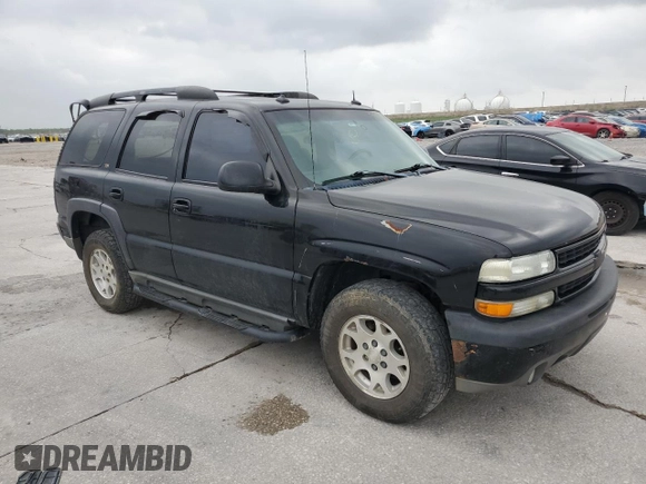 2003 Chevrolet Tahoe Z71 with VIN 1GNEK13Z63R160102, listed as a Copart auction lot 55401874 with 219,194 mi miles and Salvage Title. Bid and sale history available at carsss.com. Image 4.