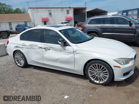 2012 BMW 3 Series 328i with VIN WBA3A5C51CF348290, listed as a IAAI auction lot 41867281 with 100,757 mi miles. Bid and sale history available at carsss.com. Image 13.