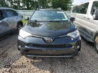 2018 Toyota RAV4 XLE with VIN 2T3RFREV0JW765995, listed as a Copart auction lot 63968785 with 114,598 mi miles and Salvage title. Bid and sale history available at DreamBid. Image 5.