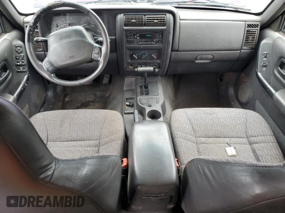 1999 Jeep Cherokee Sport с VIN 1J4FT68S6XL586023, выставлен на аукционе Copart как лот 58907195 с пробегом 391 932 миль миль и Списание • Salvage title. История ставок и продаж доступна на DreamBid. Изображение 8.