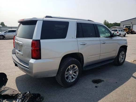 2018 Chevrolet Tahoe LT with VIN 1GNSKBKC7JR382344, listed as a Copart auction lot 58768135 with 103,557 mi miles and Salvage title. Bid and sale history available at DreamBid. Image 3.