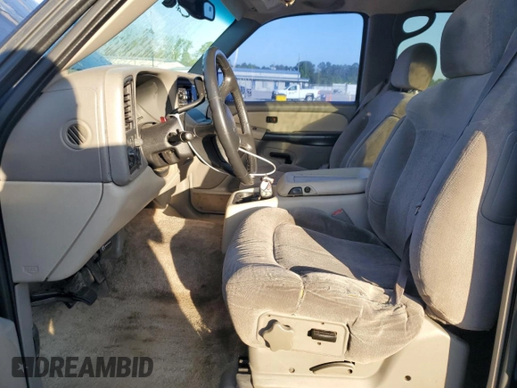 2002 Chevrolet Tahoe LS with VIN 1GNEC13ZX2J173770, listed as a Copart auction lot 52108985 with 273,327 mi miles and Salvage title. Bid and sale history available at DreamBid. Image 7.