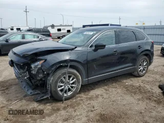 2019 Mazda CX-9 Touring z VIN JM3TCBCY4K0300233, wystawiony jako Copart lot #59424225 z przebiegiem 50 337 mil mil oraz Szkoda całkowita • Salvage title. Historia ofert i sprzedaży dostępna na DreamBid. Obrazek 1.