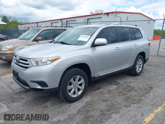 2013 Toyota Highlander with VIN 5TDZA3EH0DS037993, listed as a IAAI auction lot 42180685 with 212,729 mi miles and . Bid and sale history available at DreamBid. Image 2.