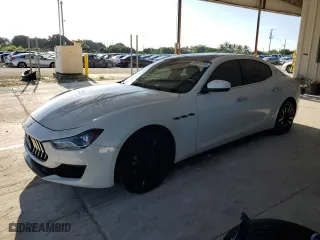 2018 Maserati Ghibli with VIN ZAM57XSA3J1273909, listed as a Copart auction lot 68951253 with 59,308 mi miles. Bid and sale history available at carsss.com. Image 1.