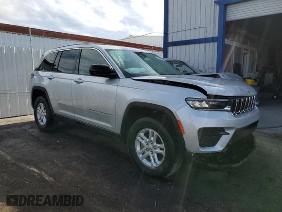 2023 Jeep Grand Cherokee Laredo with VIN 1C4RJHAG0PC674527, listed as a Copart auction lot 58538195 with 37,434 mi miles and Salvage title. Bid and sale history available at DreamBid. Image 4.
