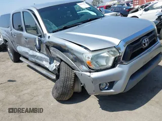 2015 Toyota Tacoma PreRunner with VIN 3TMKU4HN9FM045948, listed as a IAAI auction lot 42575327 with 67,971 mi miles and . Bid and sale history available at DreamBid. Image 1.