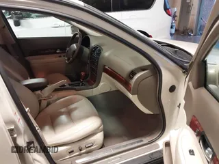 2002 Lincoln LS w/Base Pkg z VIN 1LNHM87AX2Y620293, wystawiony jako IAAI lot #41461349 z przebiegiem 129 295 mil mil oraz . Historia ofert i sprzedaży dostępna na DreamBid. Obrazek 5.