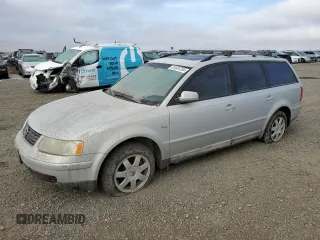 2000 Volkswagen Passat z VIN WVWRH23B6YE274455, wystawiony jako Copart lot #81634704 z przebiegiem 154 076 mil mil oraz Czysty tytuł • Clean title. Historia ofert i sprzedaży dostępna na DreamBid. Obrazek 1.