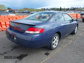 1999 Toyota Solara SE with VIN 2T1CF22P5XC163759, listed as a IAAI auction lot 41922973 with 146,042 mi miles. Bid and sale history available at carsss.com. Image 4.