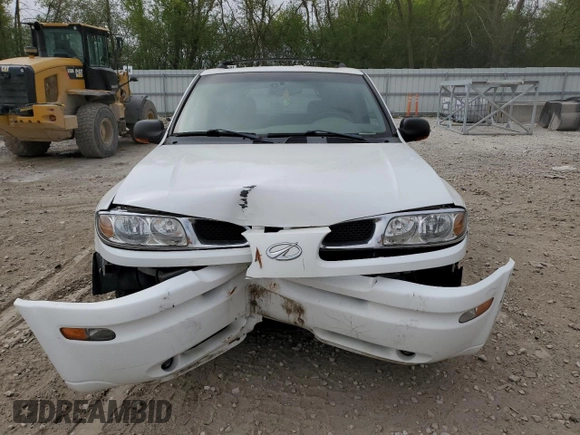 2002 Oldsmobile Bravada z VIN 1GHDT13S022177127, wystawiony jako Copart lot #57089015 z przebiegiem 168 771 mil mil oraz Nie do naprawy. Historia ofert i sprzedaży dostępna na DreamBid. Obrazek 5.