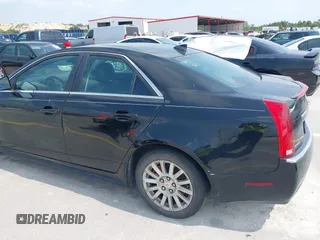 2013 Cadillac CTS Luxury with VIN 1G6DE5E50D0101763, listed as a IAAI auction lot 42090577 with 105,097 mi miles and . Bid and sale history available at DreamBid. Image 12.