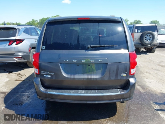 2015 Dodge Grand Caravan SXT with VIN 2C4RDGCG4FR631362, listed as a IAAI auction lot 42027066 with 149,599 mi miles and . Bid and sale history available at DreamBid. Image 16.