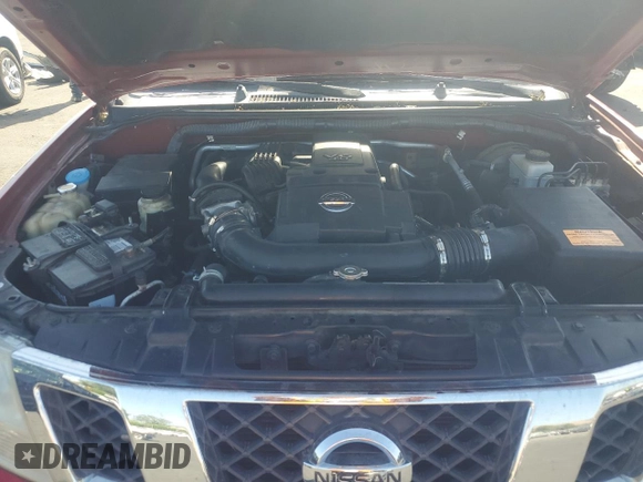 2010 Nissan Frontier SE with VIN 1N6AD0ER5AC409804, listed as a Copart auction lot 57878025 with 165,122 mi miles and Salvage title. Bid and sale history available at DreamBid. Image 11.
