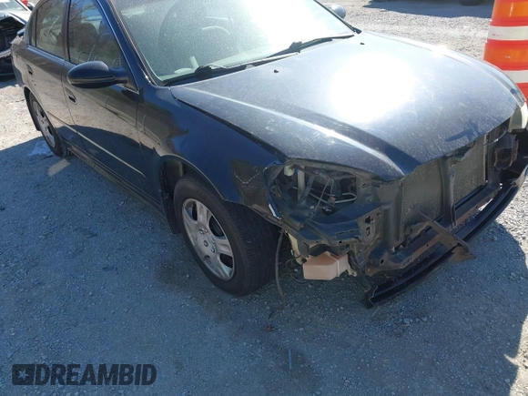 2003 Nissan Altima S with VIN 1N4AL11D33C320084, listed as a IAAI auction lot 41849903 with 212,137 mi miles. Bid and sale history available at carsss.com. Image 18.
