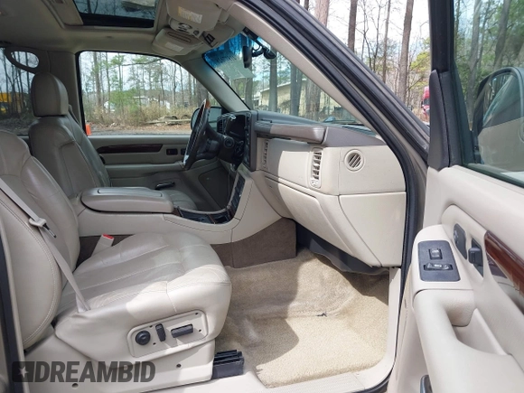2002 Cadillac Escalade z VIN 1GYEK63N52R236906, wystawiony jako IAAI lot #41877028 z przebiegiem 185 348 mil mil oraz . Historia ofert i sprzedaży dostępna na DreamBid. Obrazek 5.