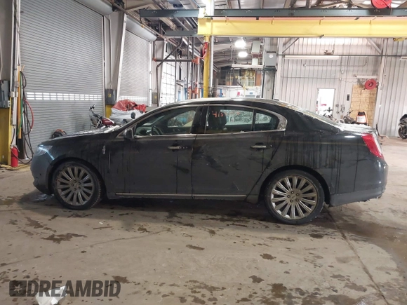 2014 Lincoln MKS with VIN 1LNHL9DK8EG609955, listed as a IAAI auction lot 41580770 with 109,864 mi miles. Bid and sale history available at carsss.com. Image 14.