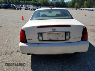 2005 Cadillac DeVille z VIN 1G6KD54Y65U100231, wystawiony jako Copart lot #55758605 z przebiegiem 166 871 mil mil oraz Szkoda całkowita • Salvage title. Historia ofert i sprzedaży dostępna na DreamBid. Obrazek 6.