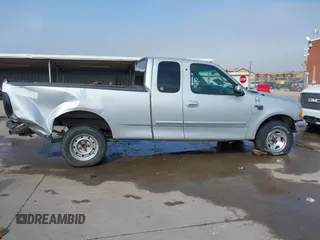 2001 Ford F-150 XL с VIN 1FTRX17L21NA88319, выставлен на аукционе IAAI как лот 41476671 с пробегом Не указан миль и . История ставок и продаж доступна на DreamBid. Изображение 14.