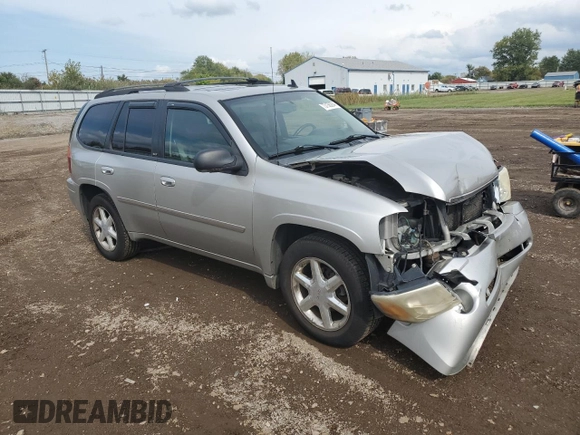 2007 GMC Envoy SLT with VIN 1GKDT13S272265100, listed as a Copart auction lot 73136264 with 245,198 mi miles and Salvage Title. Bid and sale history available at carsss.com. Image 4.