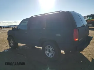 1997 GMC Yukon with VIN 1GKEK13R0VJ710179, listed as a Copart auction lot 81374234 with 186,257 mi miles and Salvage Title. Bid and sale history available at carsss.com. Image 2.