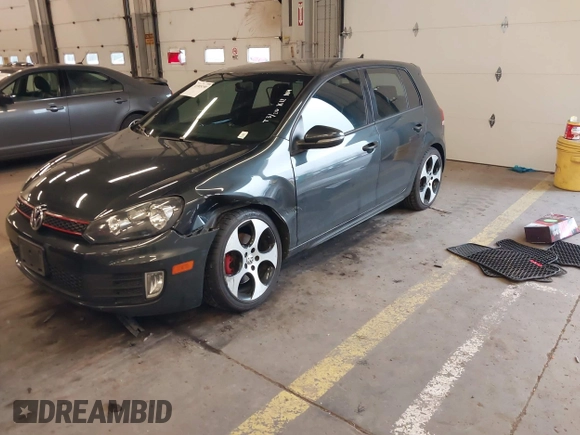 2012 Volkswagen GTI w/Sunroof & Navi PZEV with VIN WVWGD7AJ2CW100248, listed as a IAAI auction lot 41905190 with 106,489 mi miles and . Bid and sale history available at DreamBid. Image 2.