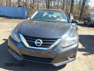 2018 Nissan Altima SR with VIN 1N4AL3AP6JC208575, listed as a IAAI auction lot 41725408 with 115,406 mi miles and . Bid and sale history available at DreamBid. Image 12.