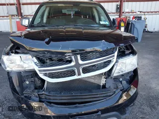 2014 Dodge Journey SXT z VIN 3C4PDDBG5ET212018, wystawiony jako IAAI lot #41737808 z przebiegiem 109 847 mil mil oraz . Historia ofert i sprzedaży dostępna na DreamBid. Obrazek 6.