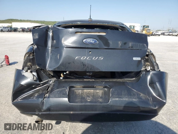 2008 Ford Focus SE z VIN 1FAHP35N08W193642, wystawiony jako Copart lot #53175515 z przebiegiem 199 968 mil mil oraz Szkoda całkowita • Salvage title. Historia ofert i sprzedaży dostępna na DreamBid. Obrazek 6.