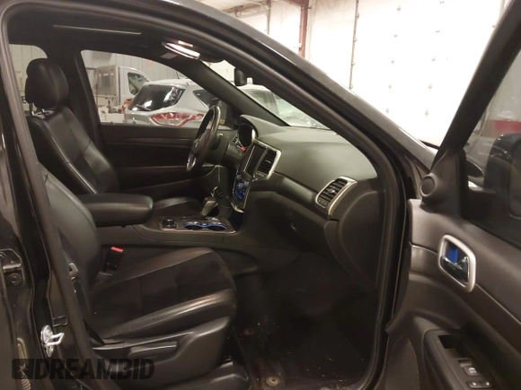 2018 Jeep Grand Cherokee Laredo E with VIN 1C4RJFAG5JC417701, listed as a IAAI auction lot 42001159 with 110,767 mi miles and . Bid and sale history available at DreamBid. Image 5.
