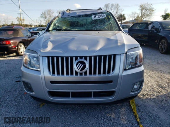 2009 Mercury Mariner Premier z VIN 4M2CU87789KJ23933, wystawiony jako Copart lot #45120455 z przebiegiem 104 465 mil mil oraz Szkody całkowita. Historia ofert i sprzedaży dostępna na DreamBid. Obrazek 5.