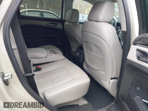 2013 Cadillac SRX Luxury Collection with VIN 3GYFNCE3XDS654531, listed as a IAAI auction lot 41931295 with 120,255 mi miles and . Bid and sale history available at carsss.com. Image 8.