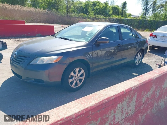 2007 Toyota Camry CE with VIN 4T1BE46K07U638516, listed as a IAAI auction lot 42128391 with 168,649 mi miles. Bid and sale history available at carsss.com. Image 2.