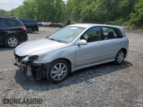2005 Kia Spectra z VIN KNAFE162755170129, wystawiony jako Copart lot #60217065 z przebiegiem 94 458 mil mil oraz Szkoda całkowita • Salvage title. Historia ofert i sprzedaży dostępna na DreamBid. Obrazek 1.