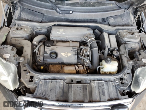 2011 MINI Countryman S with VIN WMWZC5C54BWM10218, listed as a Copart auction lot 60557685 with 192,422 mi miles and Salvage title. Bid and sale history available at DreamBid. Image 11.