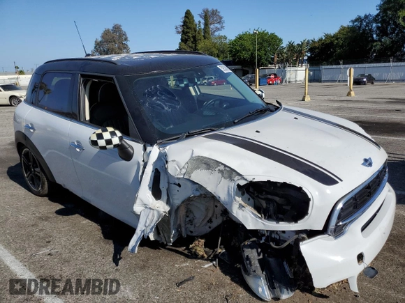 2016 MINI Countryman S with VIN WMWZC3C56GWT07894, listed as a Copart auction lot 59388905 with 80,420 mi miles and Salvage title. Bid and sale history available at DreamBid. Image 4.
