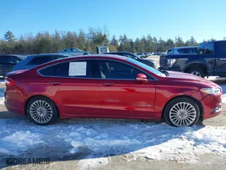 2014 Ford Fusion Titanium Hybrid with VIN 3FA6P0RUXER289087, listed as a IAAI auction lot 41418491 with 126,849 mi miles. Bid and sale history available at carsss.com. Image 13.
