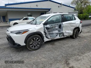 2023 Toyota Corolla Cross Hybrid S z VIN 7MUFBABG9PV014318, wystawiony jako Copart lot #56205435 z przebiegiem Nie podano mil oraz Szkoda całkowita • Salvage title. Historia ofert i sprzedaży dostępna na DreamBid. Obrazek 1.