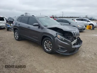 2020 Jeep Cherokee Latitude Plus with VIN 1C4PJLLB0LD605854, listed as a Copart auction lot 44743905 with 112,637 mi miles and Salvage Title. Bid and sale history available at carsss.com. Image 4.
