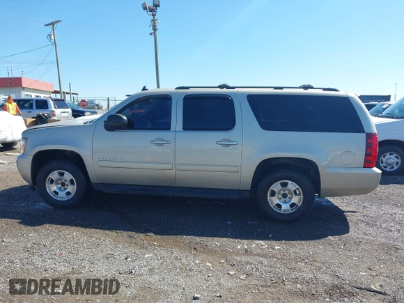 2014 Chevrolet Suburban LT with VIN 1GNSCJE07ER120130, listed as a IAAI auction lot 41792310 with 238,313 mi miles. Bid and sale history available at carsss.com. Image 14.