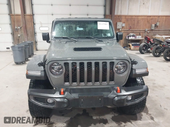 2021 Jeep Gladiator Mojave z VIN 1C6JJTEG5ML524829, wystawiony jako IAAI lot #42247982 z przebiegiem 20 158 mil mil oraz . Historia ofert i sprzedaży dostępna na DreamBid. Obrazek 12.