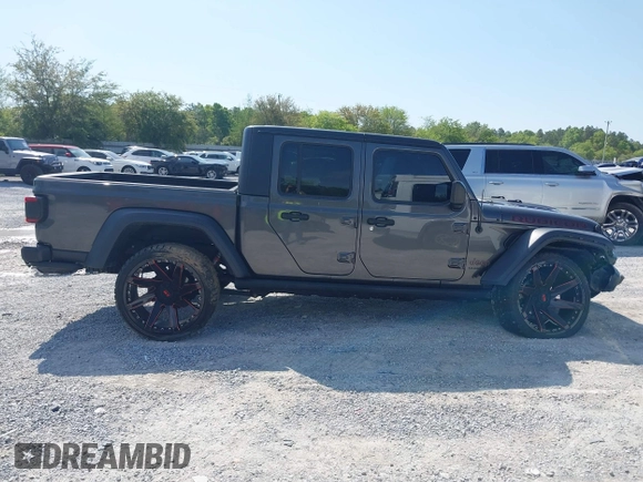 2020 Jeep Gladiator Rubicon with VIN 1C6JJTBG0LL187537, listed as a IAAI auction lot 42018914 with 53,443 mi miles and . Bid and sale history available at DreamBid. Image 14.